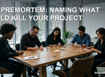 Five colleagues sit around a table silently writing on index cards during a premortem exercise