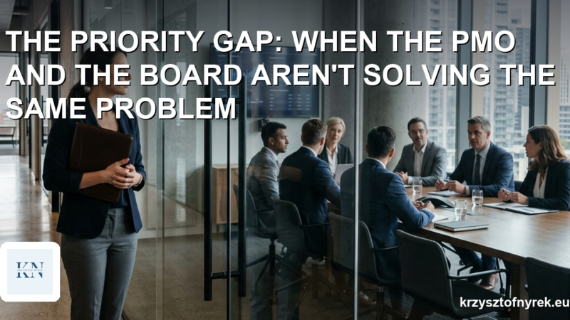 A project manager standing in a corridor outside a glass-walled boardroom where executives are meeting