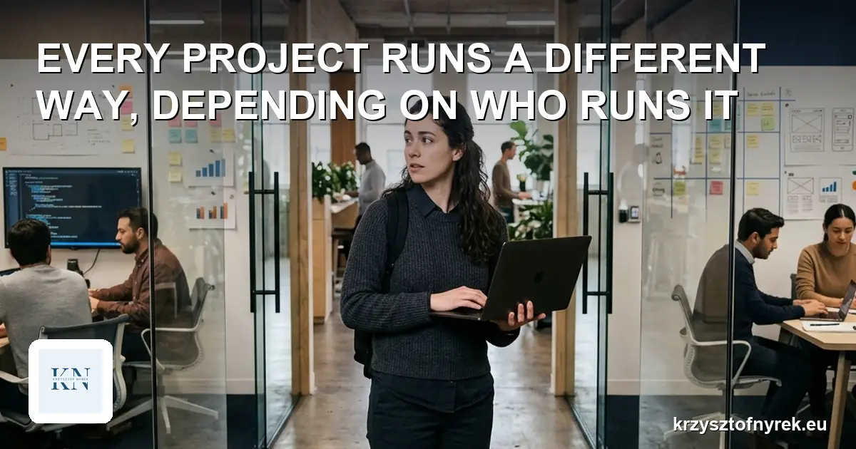 Developer with a laptop standing between two project team rooms